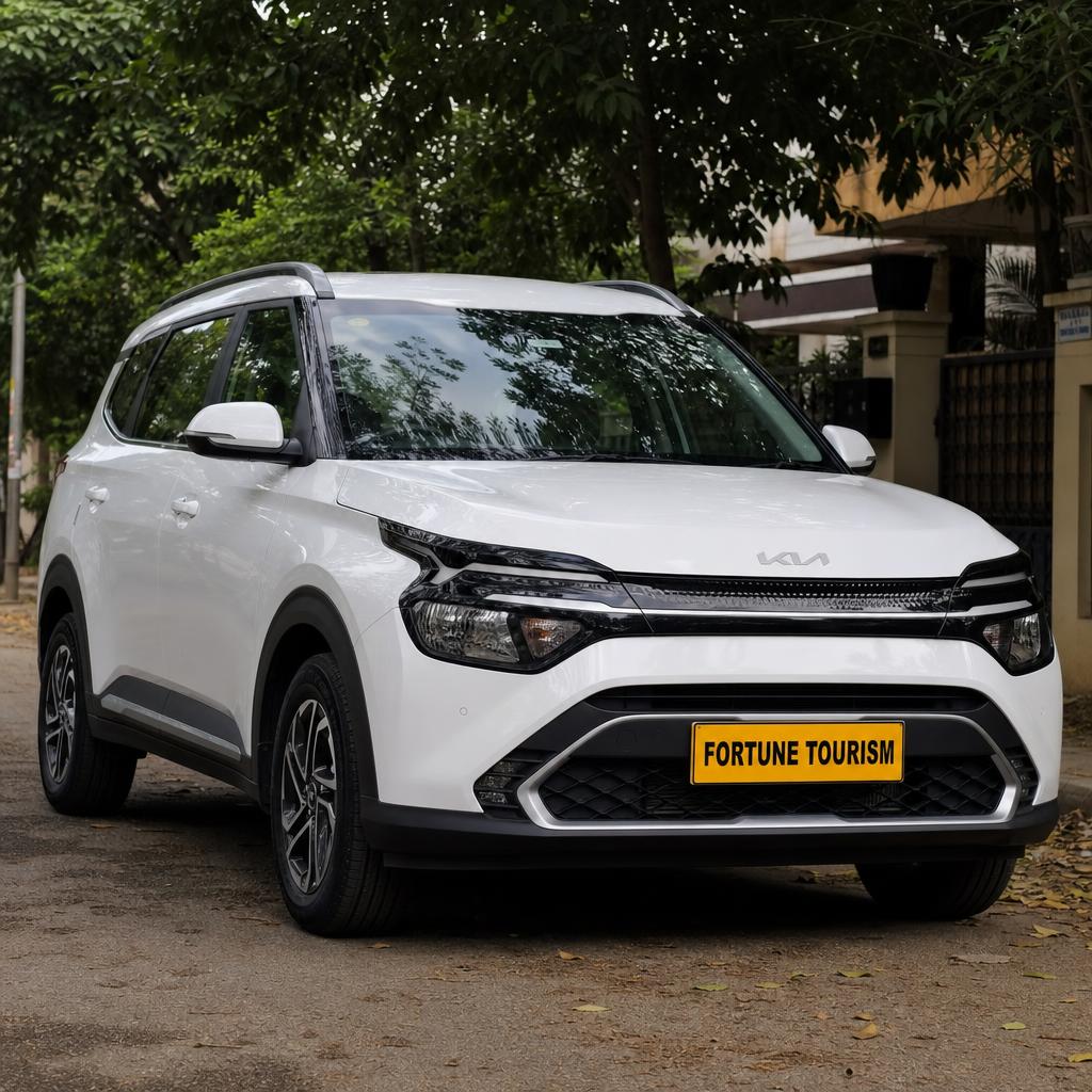 Kia Carens on a Bengaluru residential road
